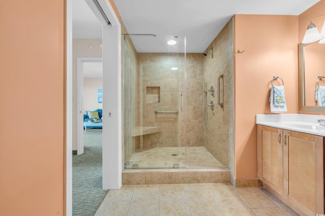 bathroom with vanity, tile patterned floors, and an enclosed shower