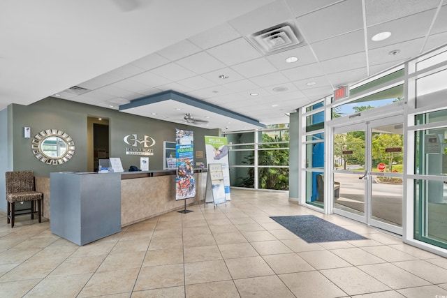 reception area with ceiling fan