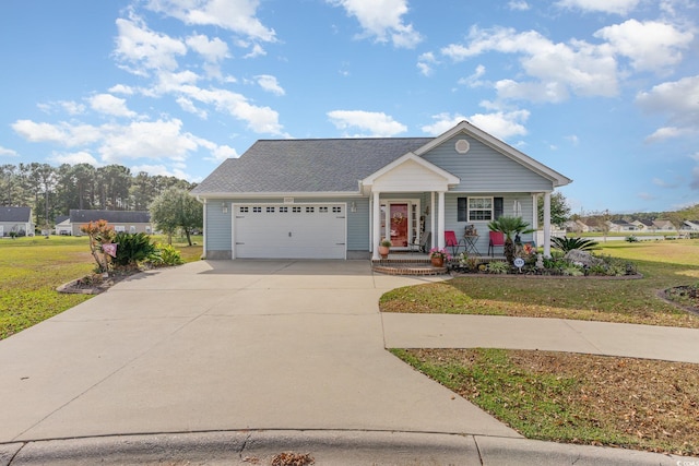 view of front of home with a garage, a porch, and a front lawn