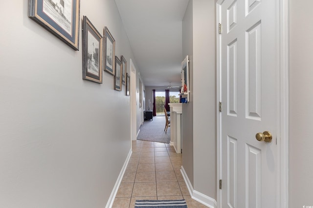 corridor with light tile patterned flooring