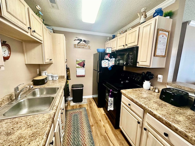 kitchen with black appliances, a textured ceiling, sink, crown molding, and light wood-type flooring