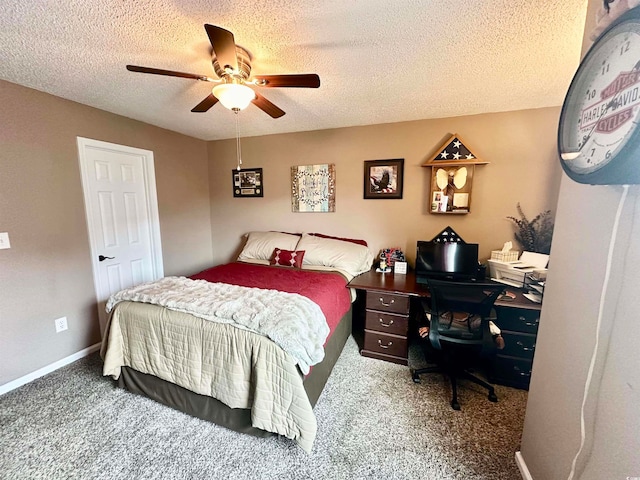 bedroom with carpet flooring, a textured ceiling, and ceiling fan