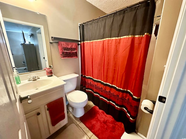 bathroom featuring toilet, tile patterned floors, curtained shower, a textured ceiling, and vanity