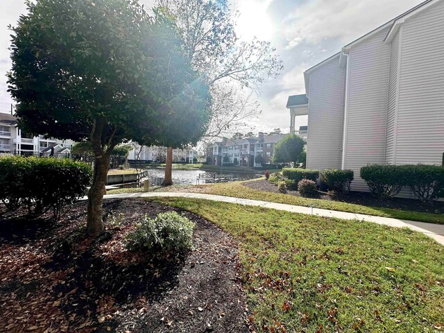 view of yard featuring a water view