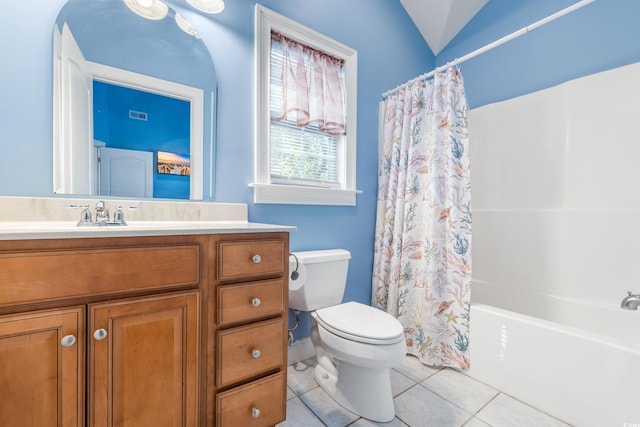 full bathroom with shower / tub combo with curtain, vanity, lofted ceiling, tile patterned floors, and toilet