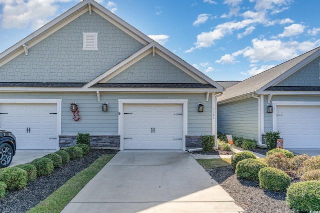 craftsman-style house with a garage