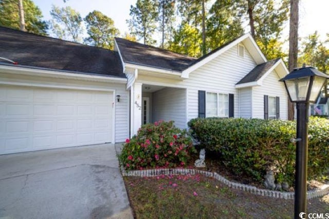 ranch-style house with a garage