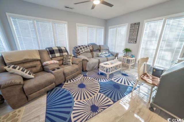 living room featuring ceiling fan