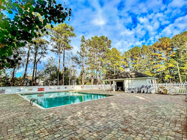 view of pool with a patio