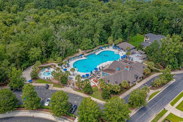 aerial view with a wooded view