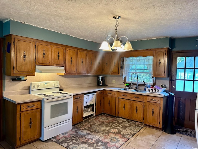 kitchen with light tile patterned floors, pendant lighting, sink, an inviting chandelier, and white electric range