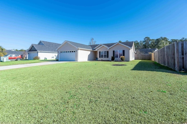 single story home featuring a garage and a front yard