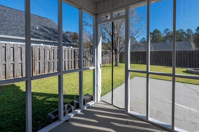 unfurnished sunroom with plenty of natural light