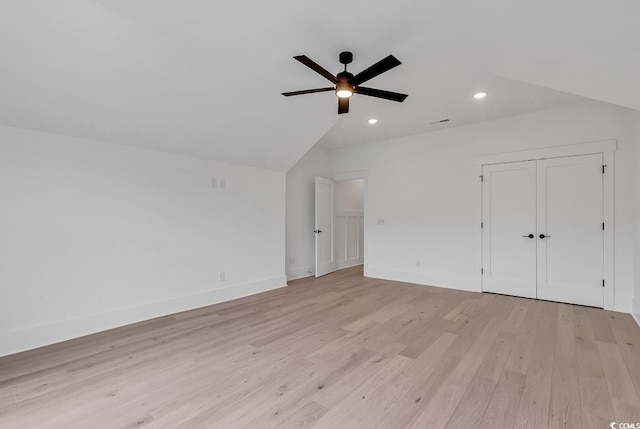 bonus room featuring ceiling fan, light hardwood / wood-style flooring, and lofted ceiling