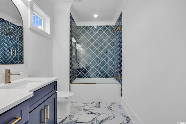 full bathroom featuring toilet, vanity, enclosed tub / shower combo, and ornamental molding