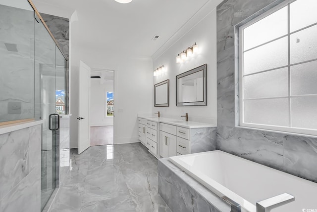 bathroom with plus walk in shower, vanity, and crown molding