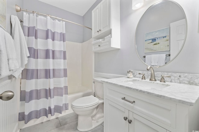 full bathroom with vanity, shower / tub combo with curtain, tile patterned floors, and toilet