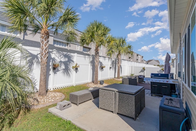 view of patio / terrace featuring outdoor lounge area and a fenced backyard