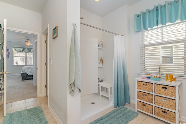 bathroom featuring tile patterned flooring, a shower with curtain, and ceiling fan