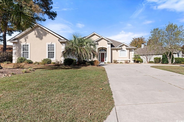 single story home with a front yard