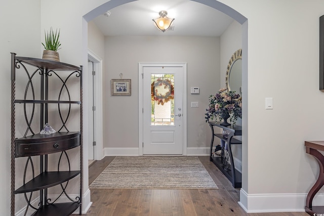 entrance foyer with dark hardwood / wood-style flooring