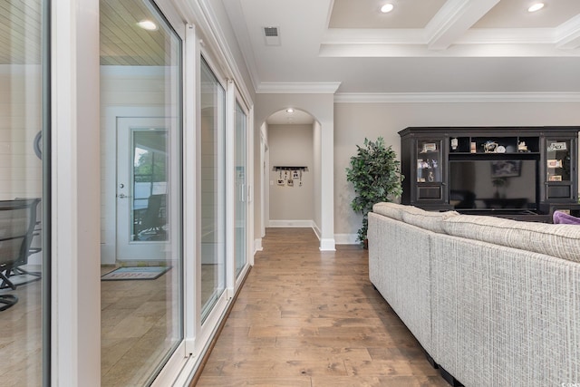 living room featuring ornamental molding and hardwood / wood-style floors