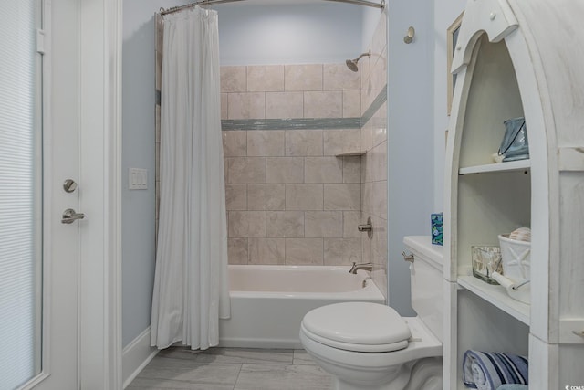 bathroom featuring toilet and shower / bathtub combination with curtain