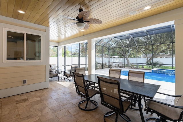 sunroom / solarium featuring wooden ceiling, ceiling fan, and a pool