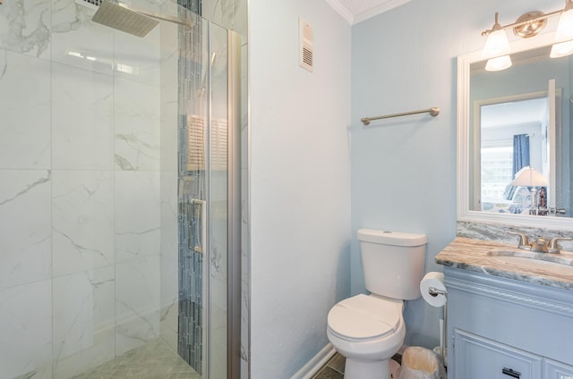 bathroom featuring vanity, ornamental molding, toilet, and walk in shower