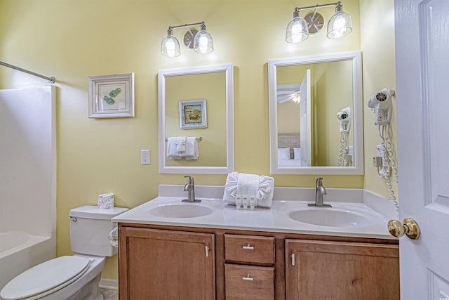 full bathroom with vanity, toilet, and shower / bathing tub combination