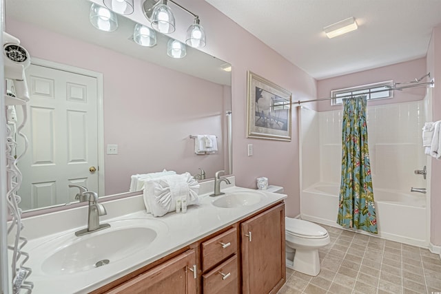 full bathroom featuring vanity, toilet, and shower / bath combo with shower curtain