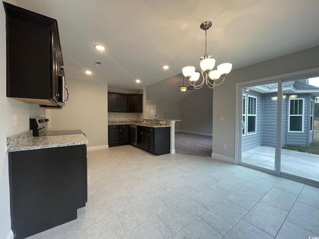 kitchen featuring light stone countertops, dark brown cabinets, range, and decorative light fixtures