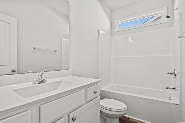 full bathroom featuring vanity, toilet, and shower / bath combination