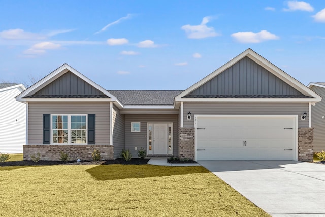 craftsman inspired home with a garage and a front yard