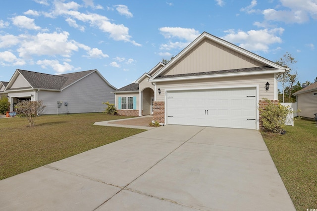 view of front of home featuring a front lawn and a garage