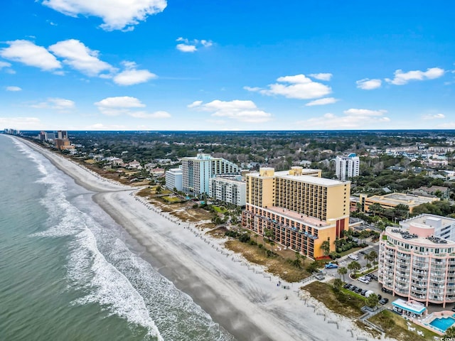 aerial view featuring a view of the beach and a water view