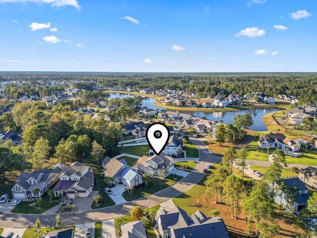 bird's eye view featuring a water view and a residential view