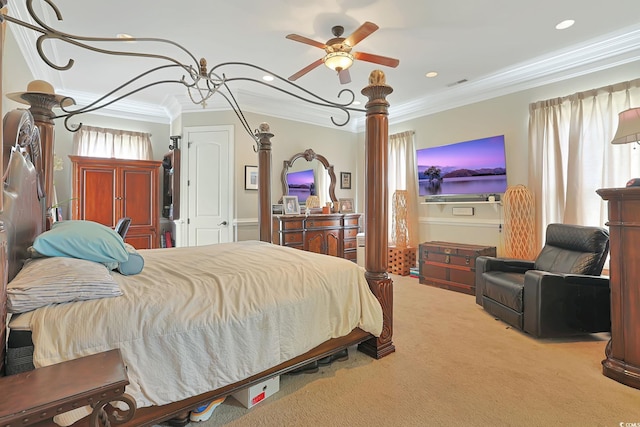 carpeted bedroom featuring ceiling fan, multiple windows, and ornamental molding