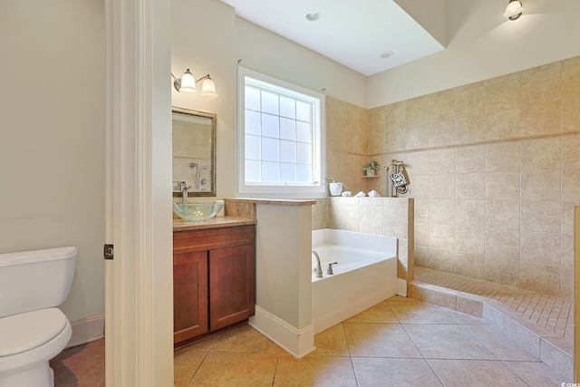 full bathroom featuring vanity, tile patterned floors, toilet, and plus walk in shower