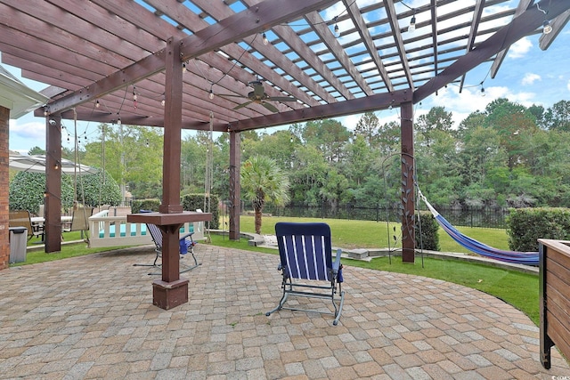 view of patio with a pergola and ceiling fan