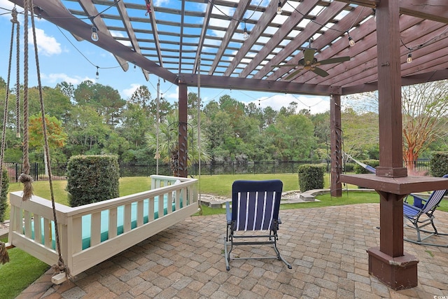 view of patio featuring a pergola and ceiling fan