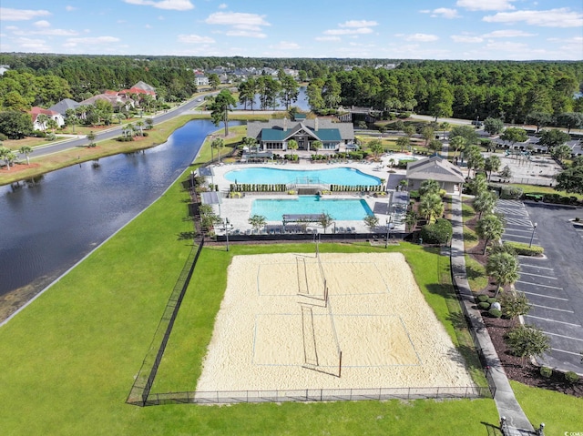 birds eye view of property with a water view