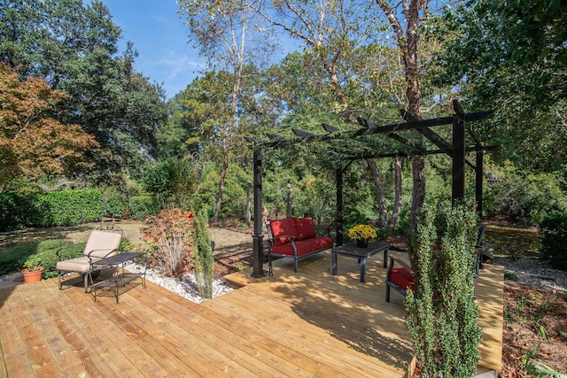 wooden deck featuring outdoor lounge area