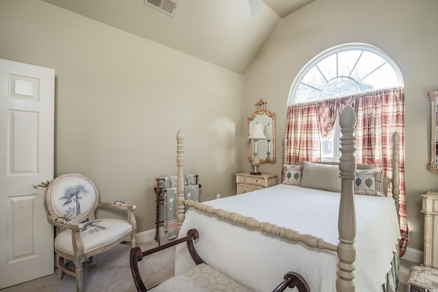 carpeted bedroom featuring vaulted ceiling