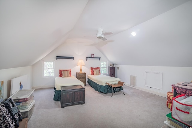 bedroom featuring ceiling fan, carpet flooring, and lofted ceiling