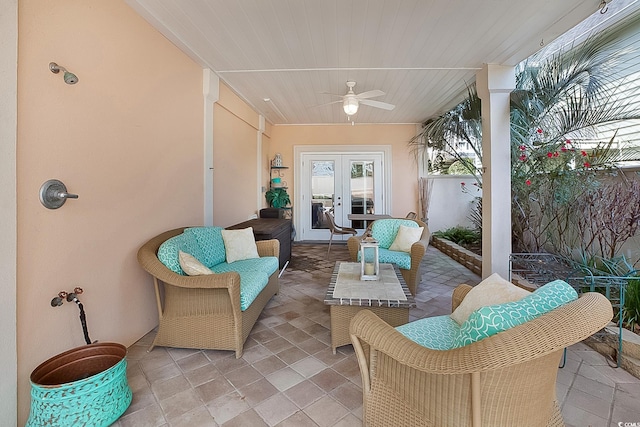 view of patio featuring french doors and ceiling fan