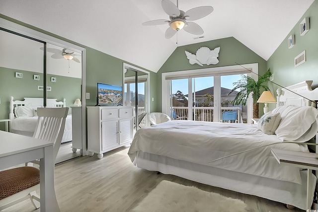 bedroom with access to exterior, light wood-type flooring, ceiling fan, and vaulted ceiling