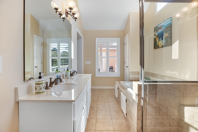 bathroom with vanity, tile patterned flooring, and plus walk in shower