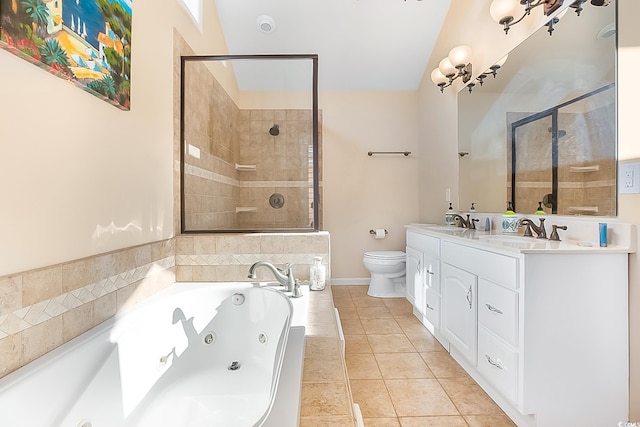 full bathroom featuring separate shower and tub, toilet, vanity, and tile patterned floors