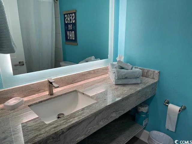 bathroom with tile patterned floors and sink